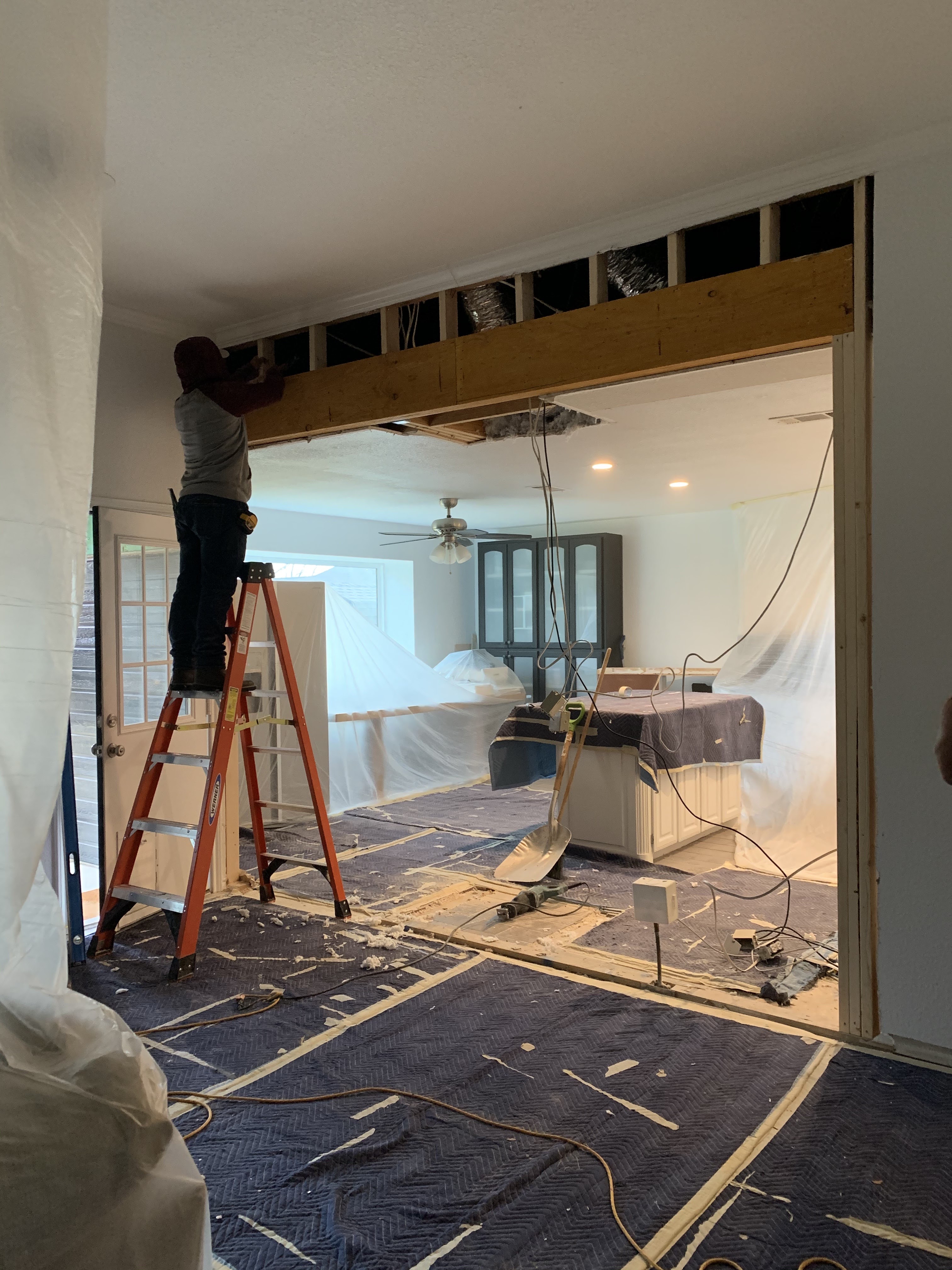 Open concept kitchen after wall removal — Jonathan Orasanu review photo