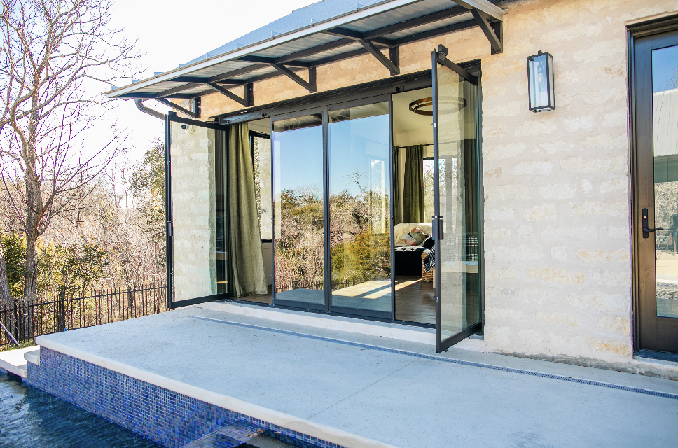 Folding glass doors wall to door conversion — before and after Glass Expanse Texas