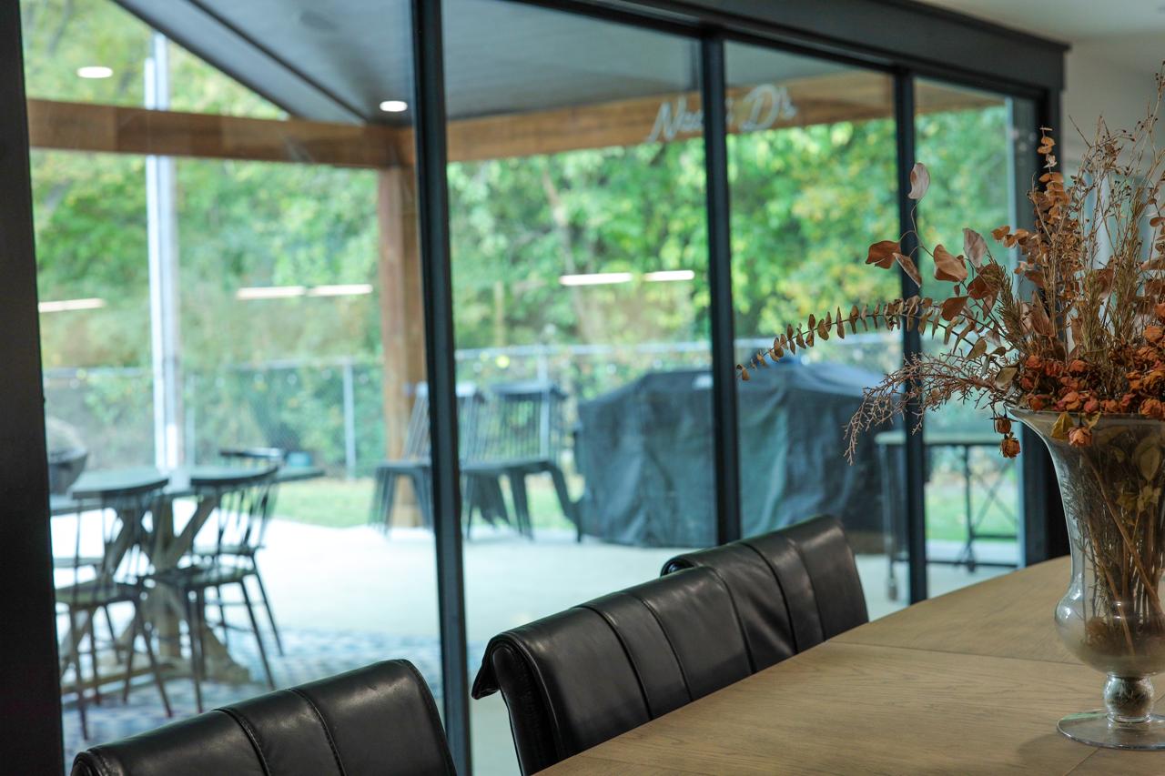 Dining room to patio sliding glass door conversion in Texas home by LBWP